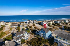 Perched perfectly between homey comfort and the ocean's call, enjoy the best of both worlds: your own pool and beach steps away!