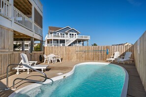 Splash in seclusion or bask on sun-drenched decks at this coastal haven, where privacy meets the pleasure of beach life.