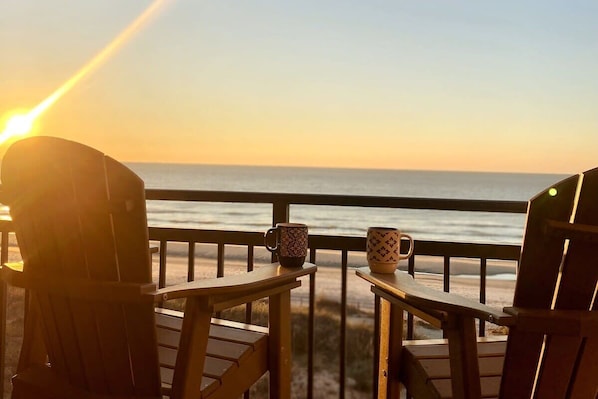 Enjoy a cup of coffee and watch the sunrise from your private balcony