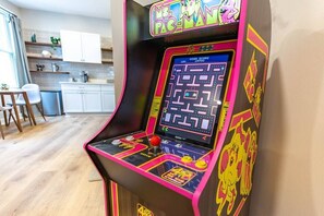 For a touch of nostalgia, challenge each other to a round of Pac-Man on our vintage arcade machine, sure to transport you back to the golden era of gaming. 