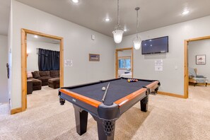 Challenge the family to a game of pool!