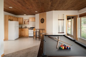 Game Room with Kitchenette Game Room with Kitchenette The pool table also turns into a ping pong table and there is a dart board