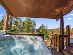 Hot tub with a view Hot tub with a view Perfect for soaking after your adventurous day.