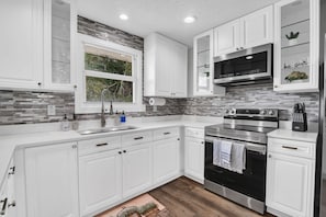 newly renovated kitchen with new stainless appliances