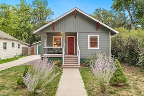 Main entry door inside, sidewalk w/Street parking available also 