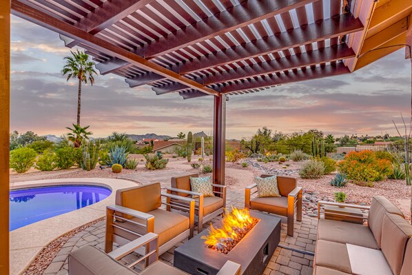 Beautiful outdoor fire pit and lounge area to take in the breathtaking views 