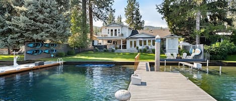 Backyard waterfront view with two docks