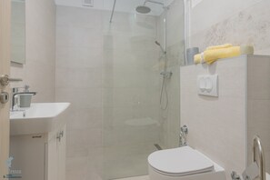 Bathroom with a walk in shower