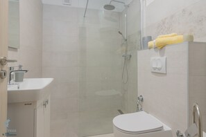 Bathroom with a walk in shower