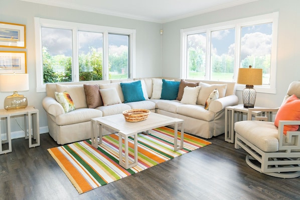 Spacious sunroom with stunning views of the farm. Attached to the kit/fam rm.