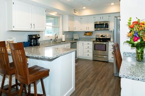 Fully stocked and updated kitchen. 