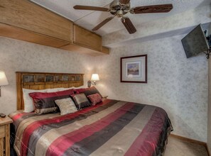 A comfortable king beds awaits with a private tv for your favorite shows before bed.
