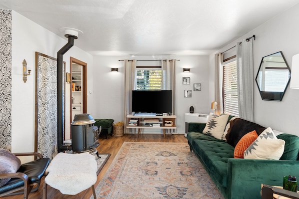 Warm up by the fire in this inviting living room.