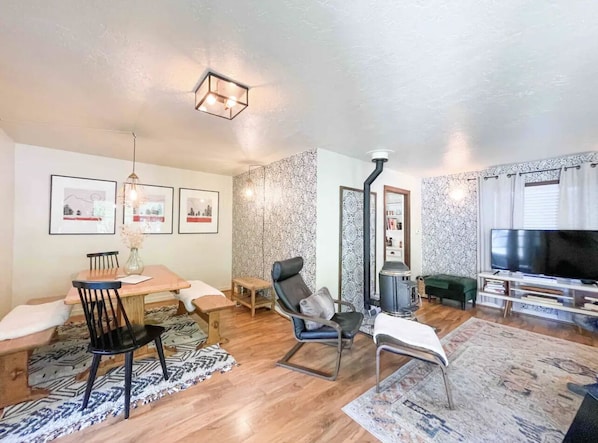 The dining and living area with an easy to use pellet stove to keep you cozy.