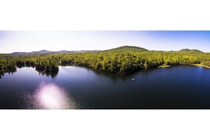 Drone pic of Santa Claus Lake facing Guest Lodge. Red square is our swim dock.