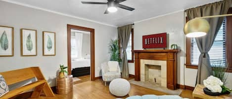 Indulge in your beautiful and spacious living room while relaxing or enjoying watching Netflix.