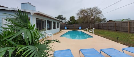 Pool area fenced in back yard for privacy & your pets