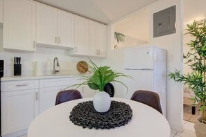Enjoy a cup of joe or tea on this dining table. kitchen fully equipped with everything you need for a weekend or monthly stay.