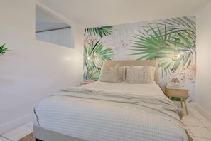 Enjoy a night's stay in this comfortable queen size bed.
