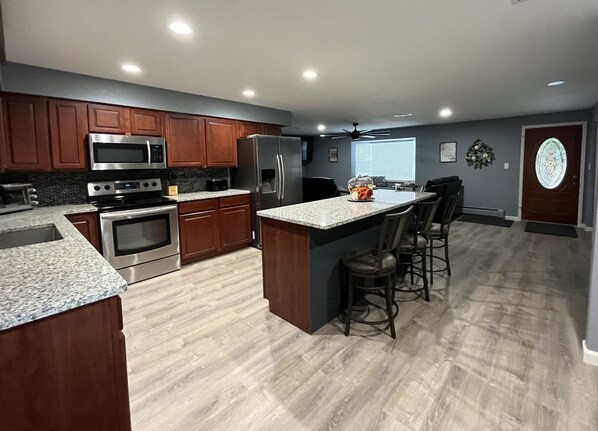 Kitchen and living room all open and spacious! 