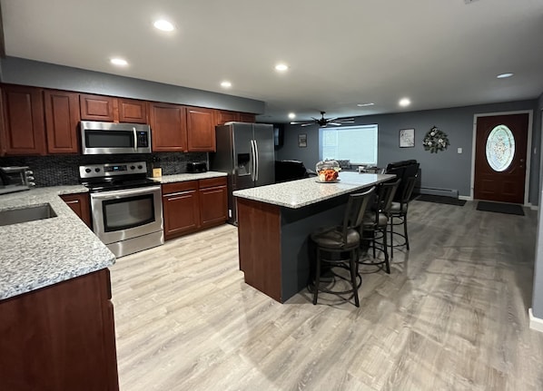 Kitchen and living room all open and spacious!