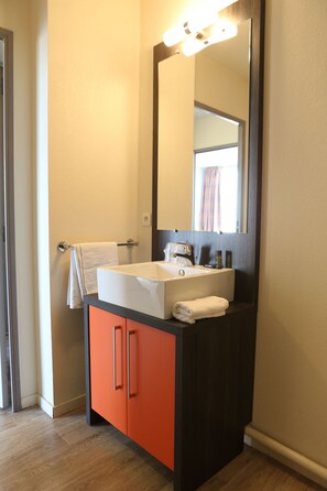 Get ready for your day in the bathroom.