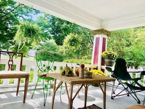 Sunny Front Porch with 3 rockers & a lounge chair