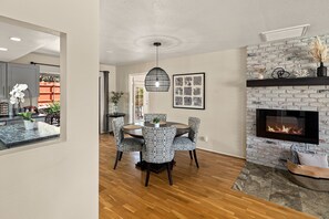 Open living room, kitchen, and dining layout