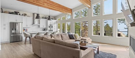 Living room with mountain & lake views