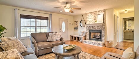 Comfortable living room with gas burning fireplace. 