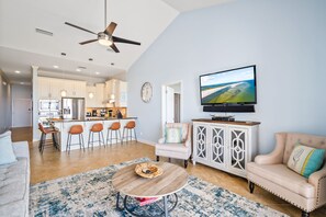 Fully stocked kitchen/living room area. Seating for 7 at the bar.