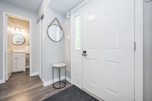 Entre and view of powder room on main floor.