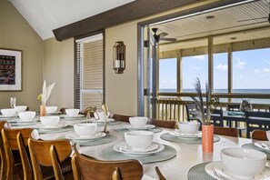 Indulge in the beauty and elegance of the decor while dining with friends and loved ones in this independent, bright dining area that comfortably seats 14.