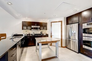 Prepare a meal in the equipped kitchen.