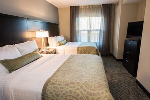 Relax on the comfy bed after a day outside.