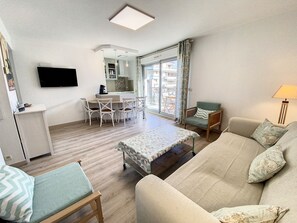 Relax in the charming and open-concept living space, perfect for resting after a great day.