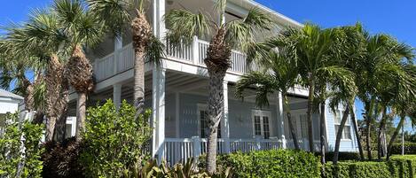 122 Angler's Way features wraparound porches on the 1st & 2nd floors 