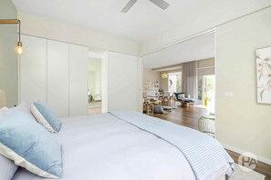 King size bedroom with pocket door for privacy