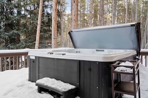 After a day out on the slopes or hiking trails ease sore muscles in the private 8-person hot tub.