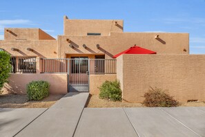 View from the street of the mesmerizing home home in a quiet community.