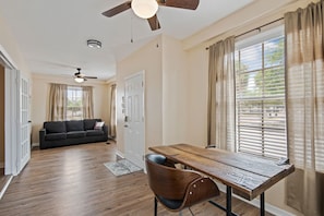 Den with office set up