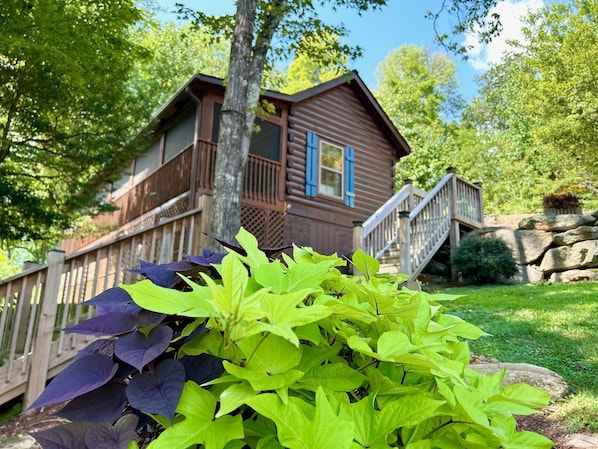 Peacefully perched on the hill with paved parking area and seasonal view of Chimney Rock