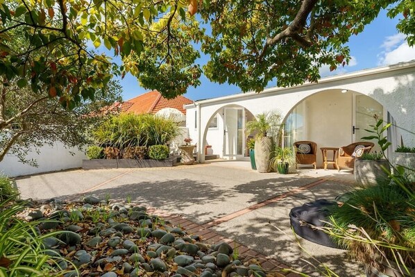 Beautiful sun filled private courtyard with indoor/outdoor flow