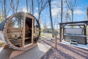 Get Steamy in the Outdoor Barrel Sauna or Hot Tub