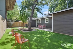 Spacious backyard with outdoor dining