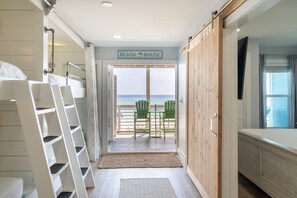 Lower-level features built-in bunk beds for plenty of space to sleep.
