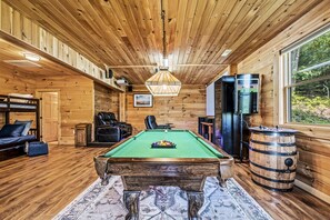 Game room including 110" Theatre, Pool Table, Air hockey, ARCADE, PS4, and Wii!