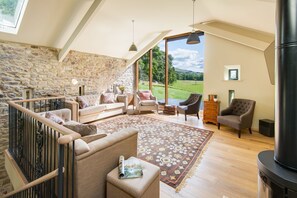 Williamston Barn - first floor sitting room with wood burning stove