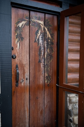 Hand painted door welcomes you in