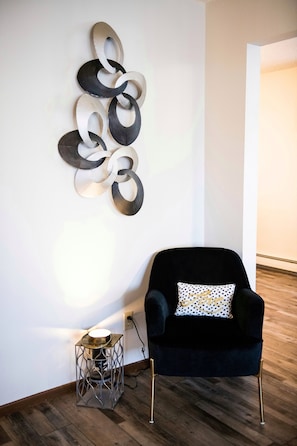 Pretty sitting area with velvet chair 